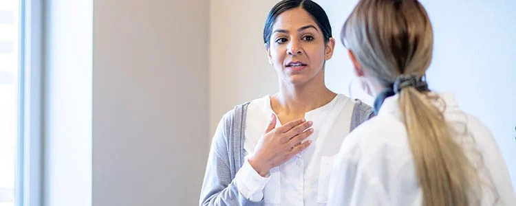 Doctor Diagnosing Patient With Mesothelioma